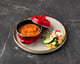 Scampi's in curry- of tomatenroomsaus